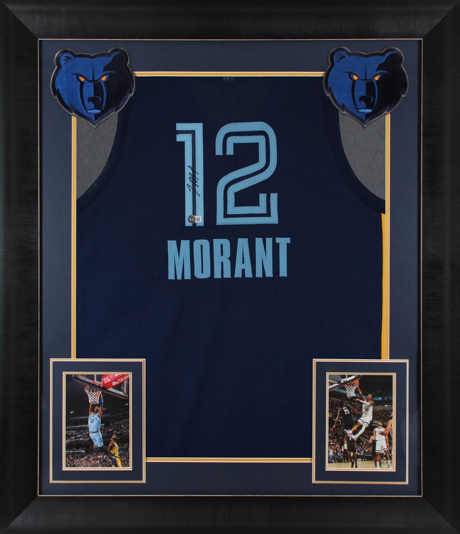 Framed Ja Morant Signed Navy Jersey With Blue Numbers Beckett Authenticated: Framed Ja Morant Signed Navy Jersey With Blue Numbers Beckett Authenticated This professionally framed navy pro style jersey features blue numbers and has been personally signed by Ja Morant of the Me