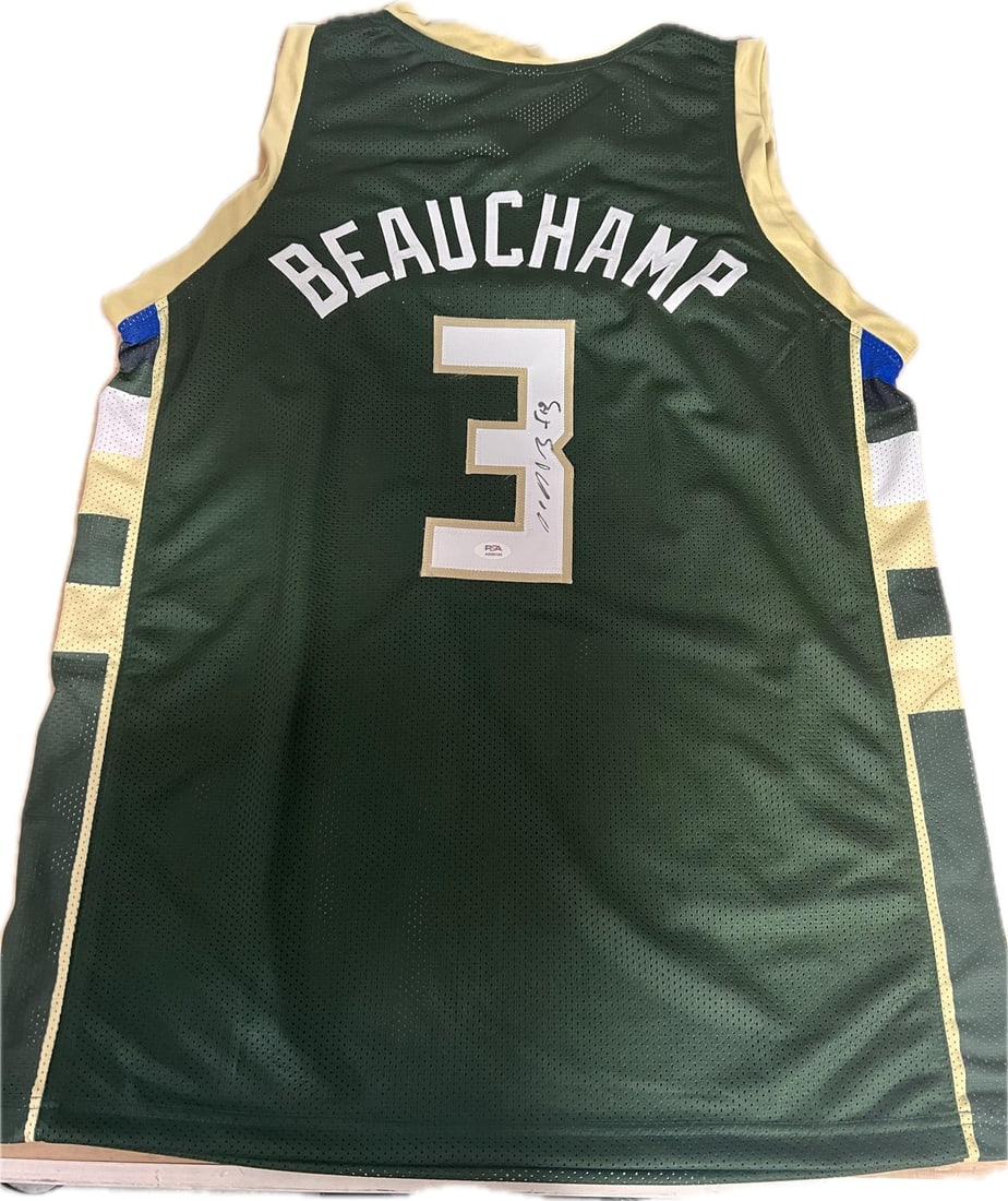 Milwaukee Bucks Jersey Autographed by Marjon Beachchamp PSA/DNA: Milwaukee Bucks Jersey Autographed by Marjon Beachchamp PSA/DNA This is an original stitched jersey autographed by Marjon Beachchamp of the Milwaukee Bucks. The signature has been authenticated by PSA