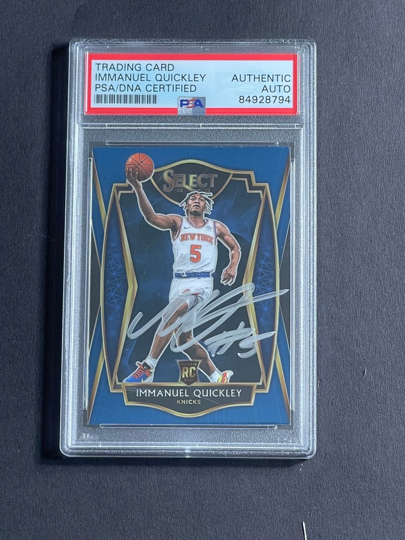 2021 Panini Select #172 Immanuel Quickley Signed PSA/DNA Card Knicks: 2021 Panini Select #172 Immanuel Quickley Signed PSA/DNA Card Knicks This listing features a 2021 Panini Select #172 card signed by Immanuel Quickley, a promising player of the New York Knicks. The au