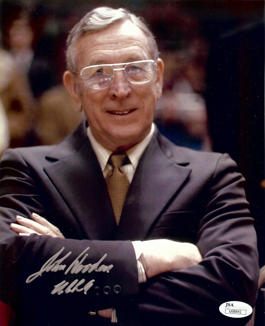 John Wooden Autographed 8X10 Photo UCLA Bruins JSA Certified: John Wooden Autographed 8X10 Photo UCLA Bruins JSA Certified This is an authentic 8x10 photo of the legendary UCLA Bruins coach, John Wooden, featuring his signature. The photo is original and has bee