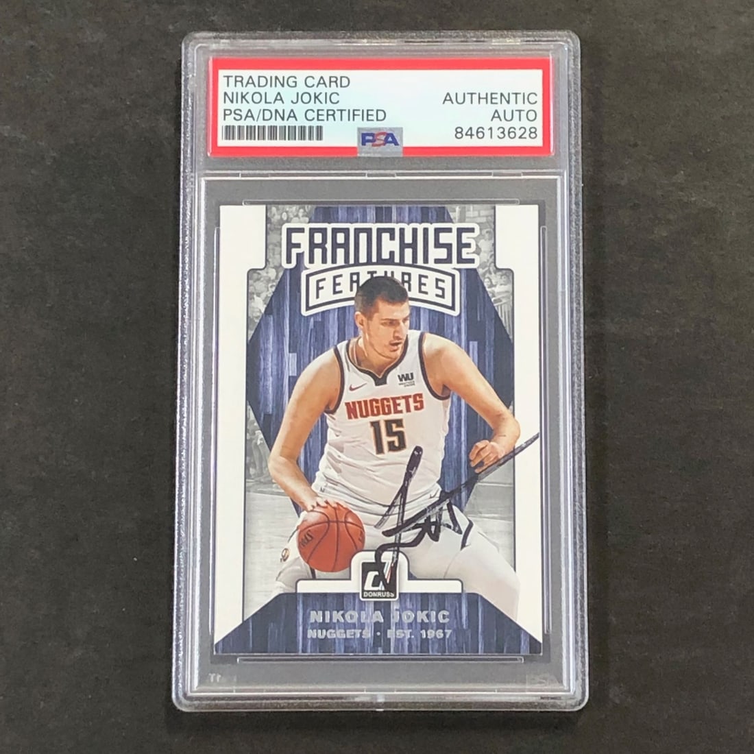 Nikola Jokic signed Donruss Franchise Features PSA card Denver Nuggets: Nikola Jokic signed Donruss Franchise Features PSA card Denver Nuggets This is a 2019-20 Donruss Franchise Features #21 basketball trading card featuring Nikola Jokic of the Denver Nuggets. The card i