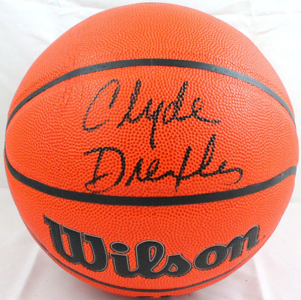 Wilson NBA basketball signed by Clyde Drexler JSA witnessed black: Wilson NBA basketball signed by Clyde Drexler JSA witnessed black This is a Wilson NBA basketball autographed by Clyde Drexler. The signature has been authenticated by James Spence Authentication (JSA
