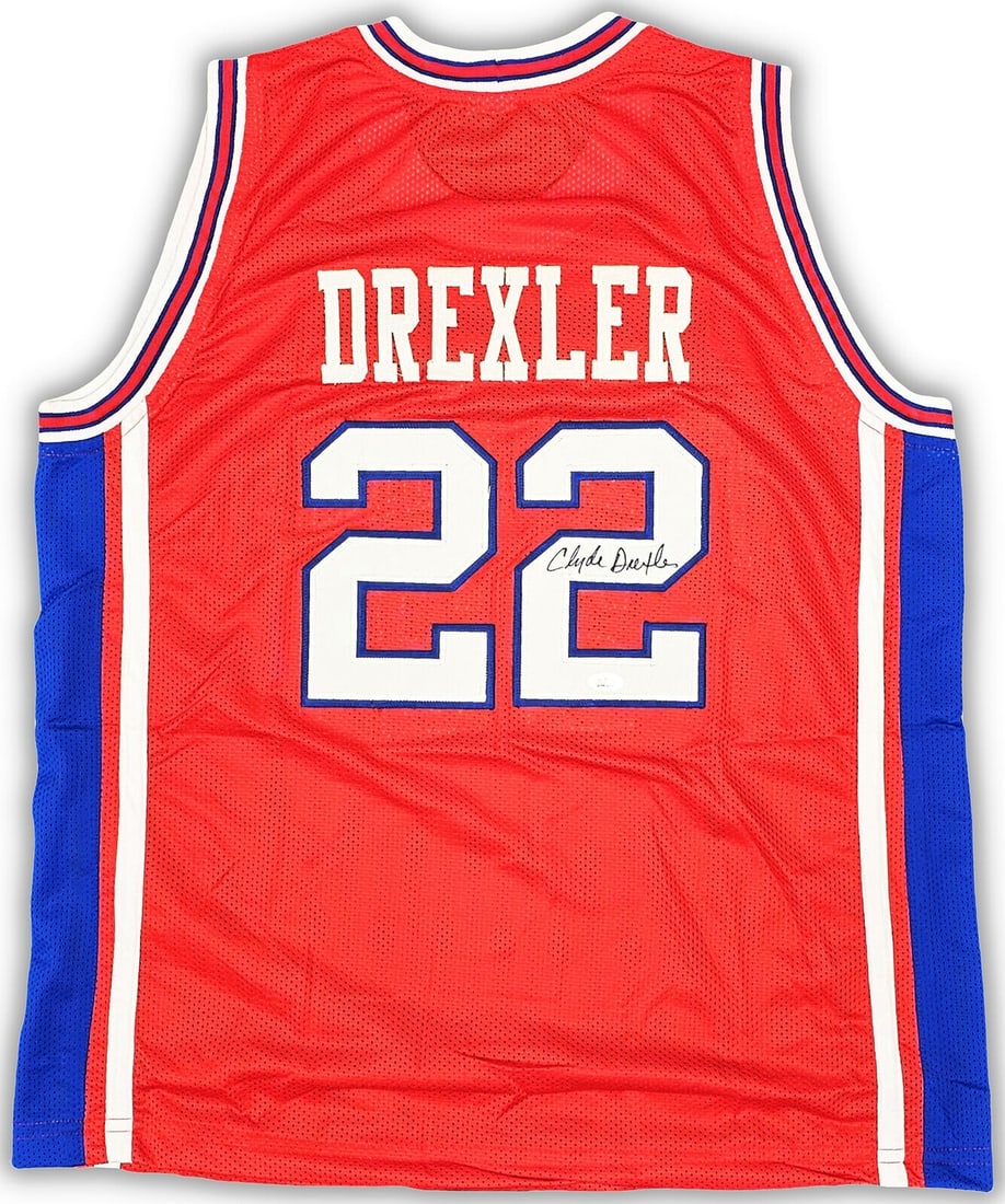 Clyde Drexler Autographed Houston Cougars Jersey JSA Certified: Clyde Drexler Autographed Houston Cougars Jersey JSA Certified This is an original autographed jersey of Clyde Drexler, a legendary basketball player known for his time with the Houston Cougars. The j