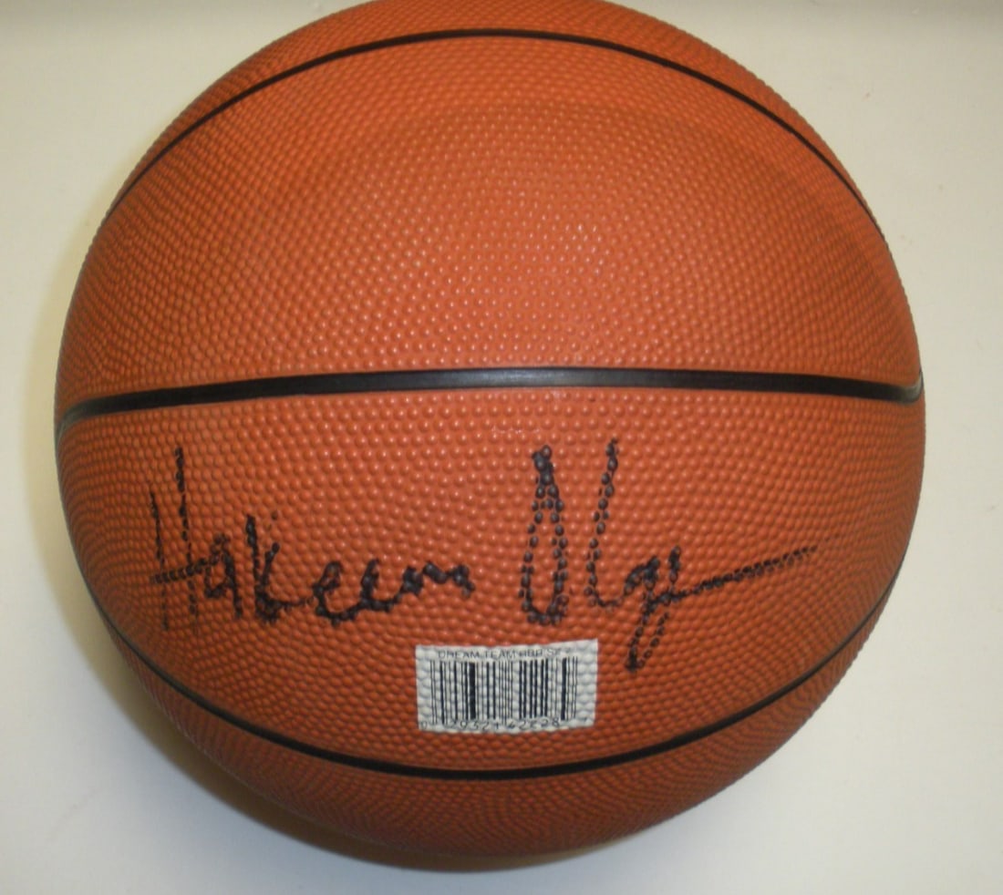Signed Hakeem Olajuwon Houston Rockets basketball with COA: Signed Hakeem Olajuwon Houston Rockets basketball with COA This is an original basketball signed by Hakeem Olajuwon of the Houston Rockets. The ball is an authentic, original item and comes with a cer