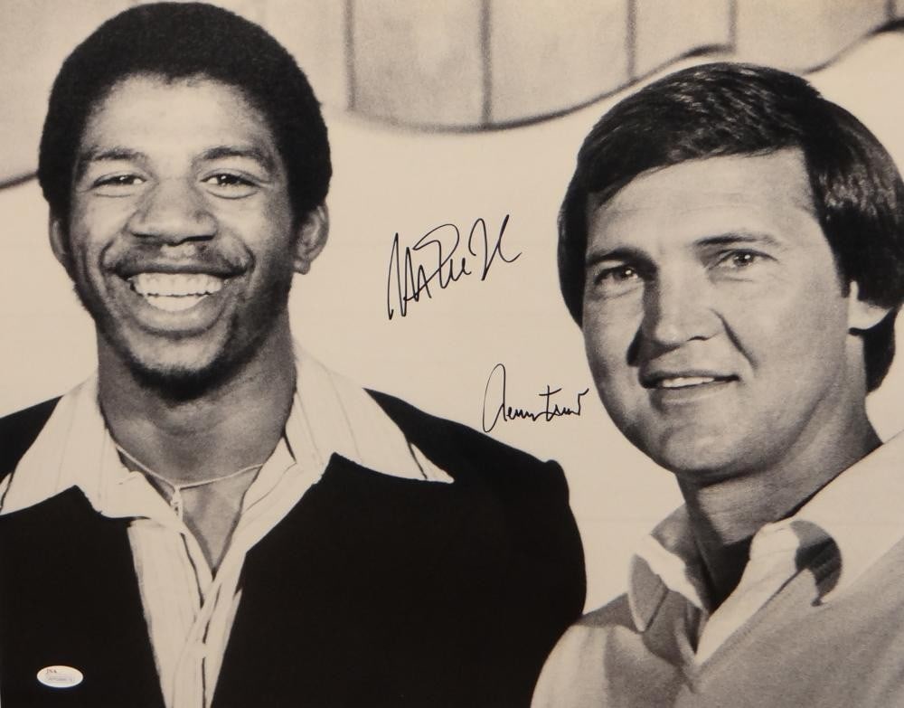 Autographed Lakers 16x20 Black White Photo Magic Johnson Jerry West JSA Witnessed: Autographed Lakers 16x20 Black White Photo Magic Johnson Jerry West JSA Witnessed This pre-owned 16x20 black and white photograph features autographs from Magic Johnson and Jerry West. The photo is an
