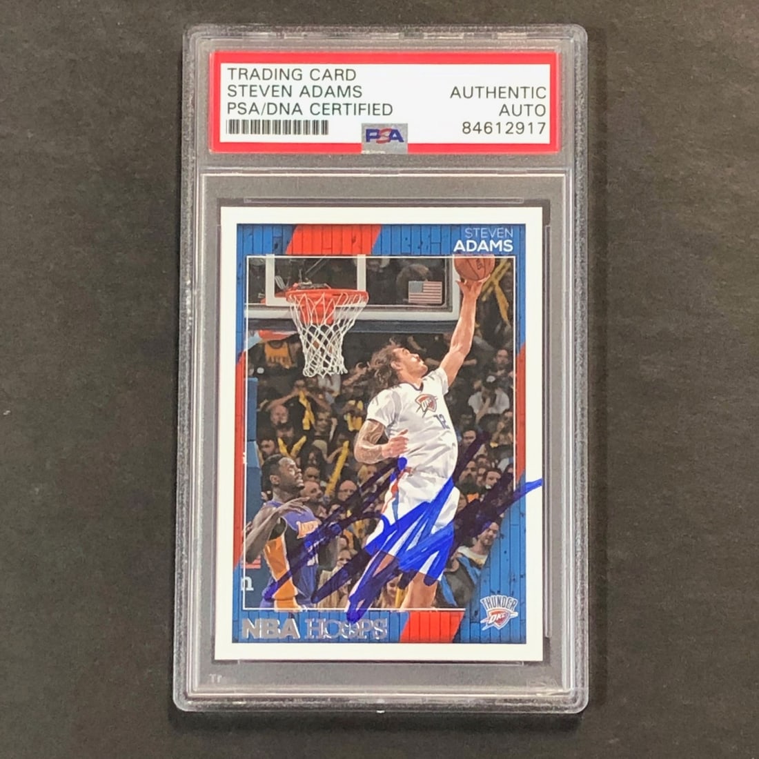 2016-17 NBA Hoops #132 Steven Adams Signed Card PSA/DNA Thunder: 2016-17 NBA Hoops #132 Steven Adams Signed Card PSA/DNA Thunder This listing features a 2016-17 NBA Hoops #132 trading card signed by Steven Adams, a prominent player in the NBA. The autograph has bee