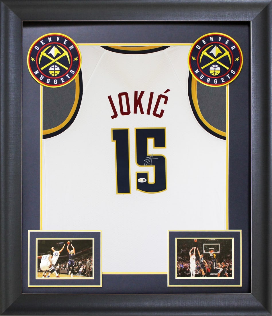 Framed Nikola Jokic Denver Nuggets autographed white pro style jersey JSA: Framed Nikola Jokic Denver Nuggets autographed white pro style jersey JSA This professionally framed white pro style jersey has been personally signed by Nikola Jokic of the Denver Nuggets. The jersey