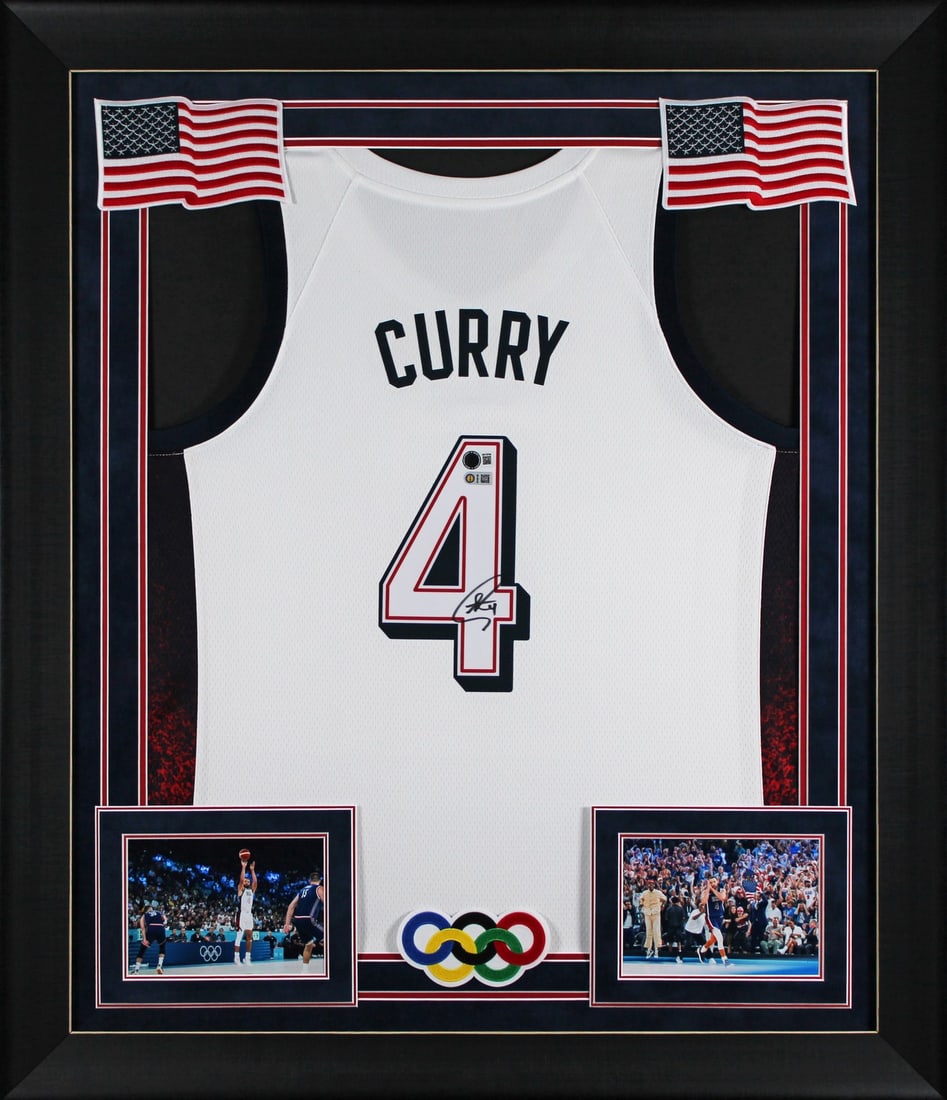 Framed Team USA Nike Jersey Signed by Stephen Curry Beckett Authenticated: Framed Team USA Nike Jersey Signed by Stephen Curry Beckett Authenticated This professionally framed Team USA white Nike Swingman jersey has been personally signed by Stephen Curry of the Golden State
