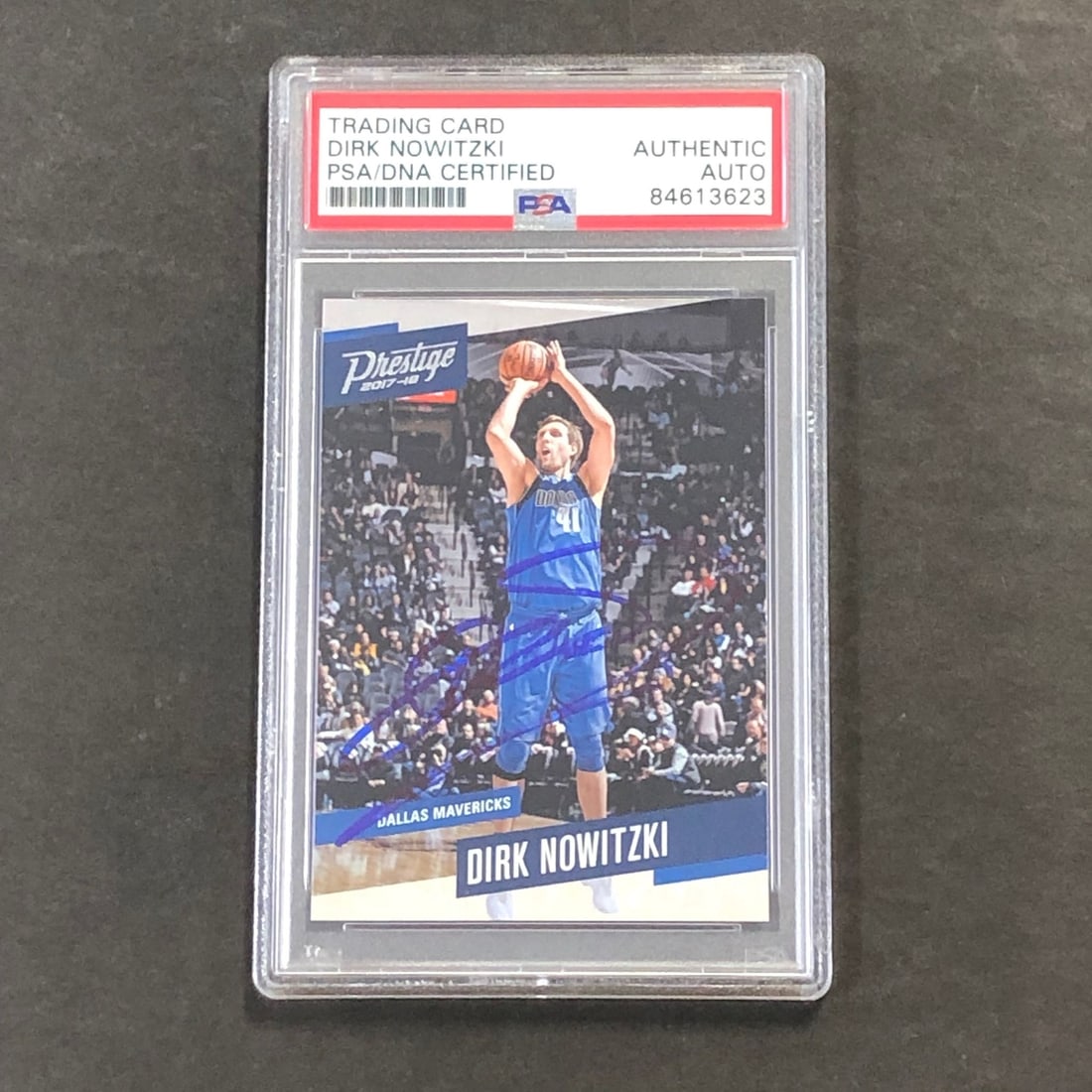 2017-18 Panini Prestige #76 Dirk Nowitzki Signed Card PSA/DNA: 2017-18 Panini Prestige #76 Dirk Nowitzki Signed Card PSA/DNA This is a 2017-18 Panini Prestige #76 basketball card featuring the signature of Dirk Nowitzki, a legendary player for the Dallas Maverick