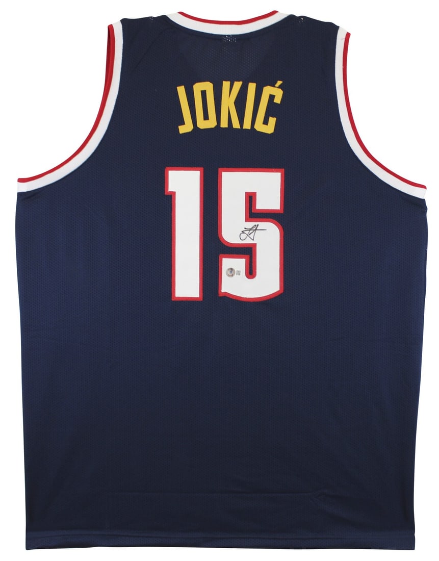 Nikola Jokic Signed Navy Blue Pro Style Jersey Denver Nuggets BAS Authenticated: Nikola Jokic Signed Navy Blue Pro Style Jersey Denver Nuggets BAS Authenticated This authentic navy blue pro style jersey has been personally signed by Nikola Jokic of the Denver Nuggets. It features 