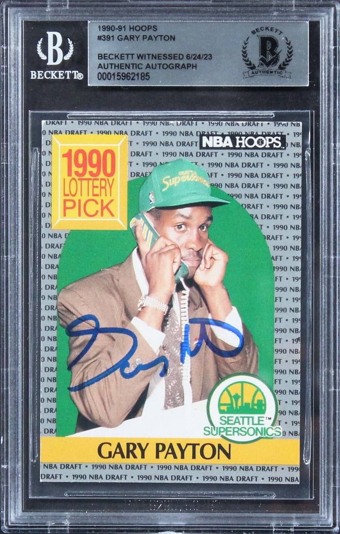 Gary Payton Signed 1990 Hoops Rookie Card Beckett Authenticated Slab Seattle: Gary Payton Signed 1990 Hoops Rookie Card Beckett Authenticated Slab Seattle This is an original 1990 Hoops #391 rookie card that has been personally signed by Gary Payton of the Seattle Supersonics. 