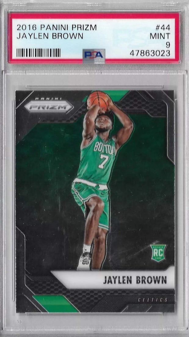 2016 Panini Prizm Jaylen Brown Rookie RC Basketball Card PSA 9: 2016 Panini Prizm Jaylen Brown Rookie RC Basketball Card PSA 9 This graded 2016 Panini Prizm Jaylen Brown #44 Rookie RC Basketball Card is a must-have for collectors and fans alike. Encapsulated and g