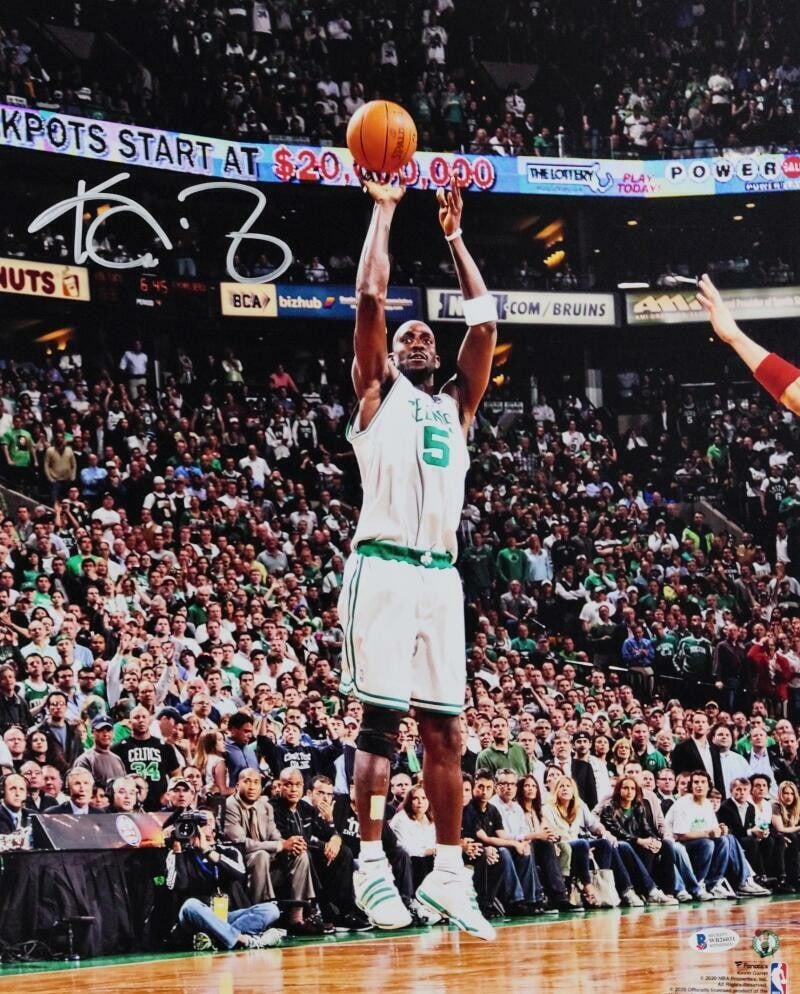 Kevin Garnett Autographed 16x20 Celtics Photo With Beckett Authentication: Kevin Garnett Autographed 16x20 Celtics Photo With Beckett Authentication This is an original 16x20 photo featuring Kevin Garnett of the Boston Celtics, captured during a jump shot. The photo is hand-