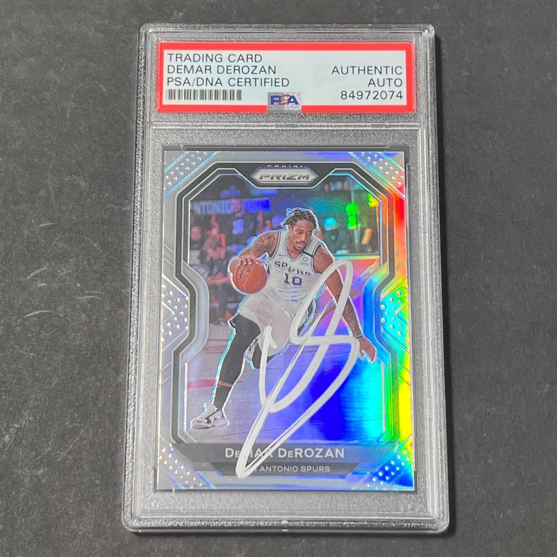 DeMar DeRozan Autographed 2020-21 Prizm Card PSA Slabbed San Antonio Spurs: DeMar DeRozan Autographed 2020-21 Prizm Card PSA Slabbed San Antonio Spurs This is a 2020-21 Panini Prizm #210 trading card featuring DeMar DeRozan of the San Antonio Spurs. The card has been hand-sig