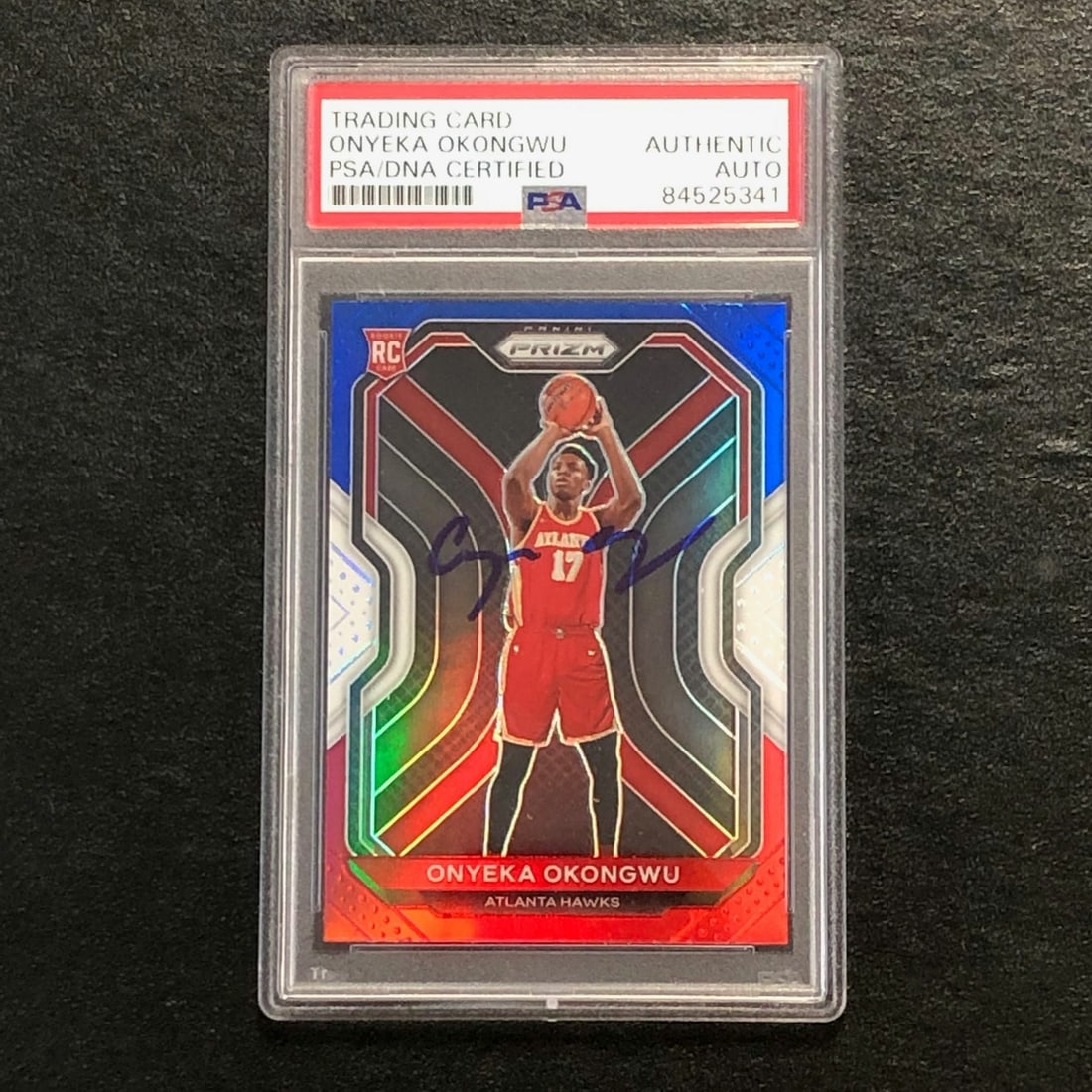 PSA DNA Onyeka Okongwu signed Panini Prizm #260 card: PSA DNA Onyeka Okongwu signed Panini Prizm #260 card This is a 2020-21 Panini Prizm Red White Blue #260 trading card featuring Onyeka Okongwu of the Atlanta Hawks. The card has been hand-signed by Ony