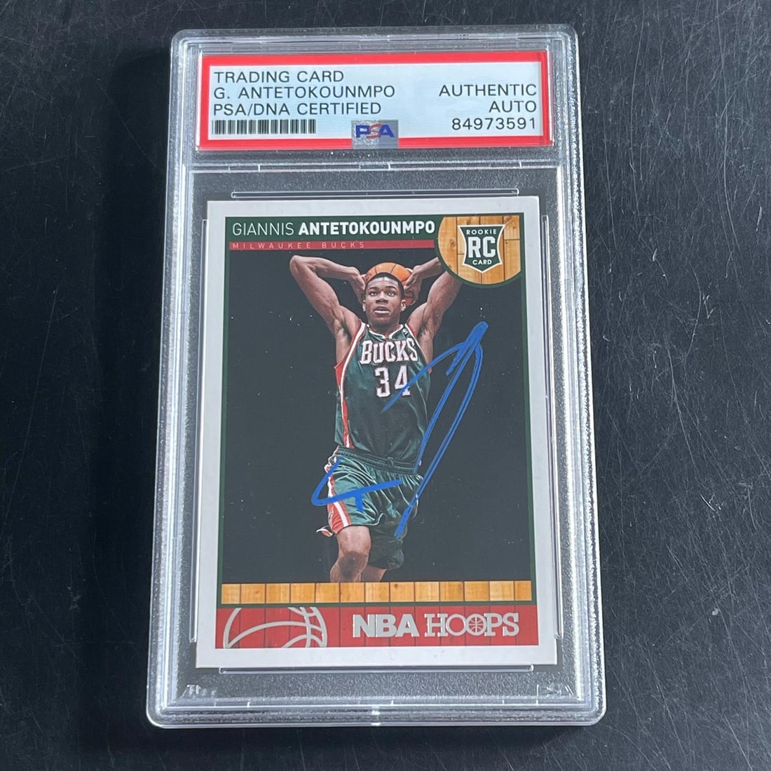 Giannis Antetokounmpo PSA Signed Rookie Card Panini Hoops #275: Giannis Antetokounmpo PSA Signed Rookie Card Panini Hoops #275 This is a 2013-14 Panini Hoops RC #275 rookie card featuring Giannis Antetokounmpo of the Milwaukee Bucks. The card is autographed by Gia