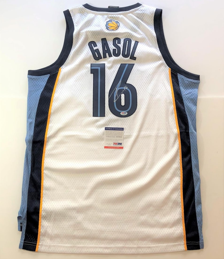 Pau Gasol Autographed Jersey PSA/DNA Memphis Grizzlies Original: Pau Gasol Autographed Jersey PSA/DNA Memphis Grizzlies Original This is an original, pre-owned basketball jersey that has been expertly stitched and autographed by Pau Gasol, a renowned player for the