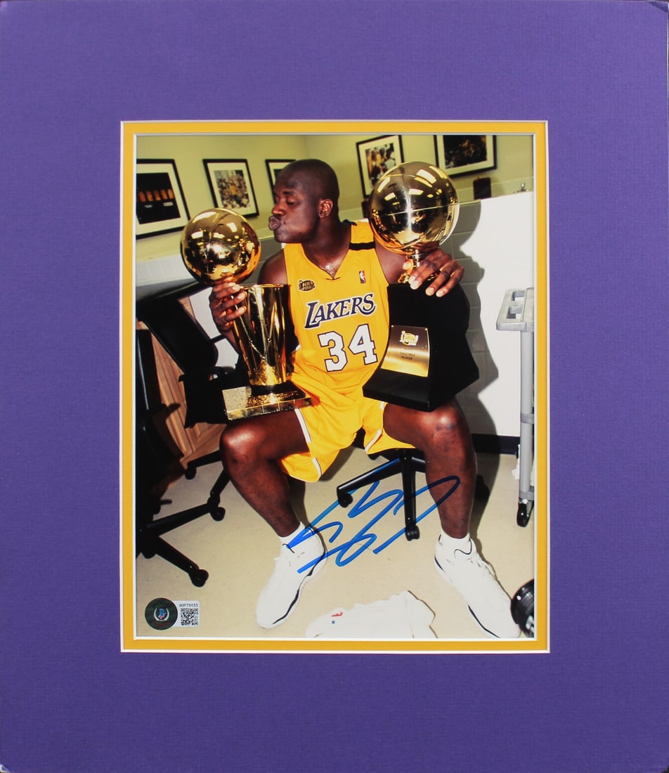 Shaquille O'Neal Signed 8x10 Photo Los Angeles Lakers BAS Witnessed: Shaquille O'Neal Signed 8x10 Photo Los Angeles Lakers BAS Witnessed This stunning autographed 8x10 matted photo features Shaquille O'Neal, a legendary player of the Los Angeles Lakers. The photo is pe