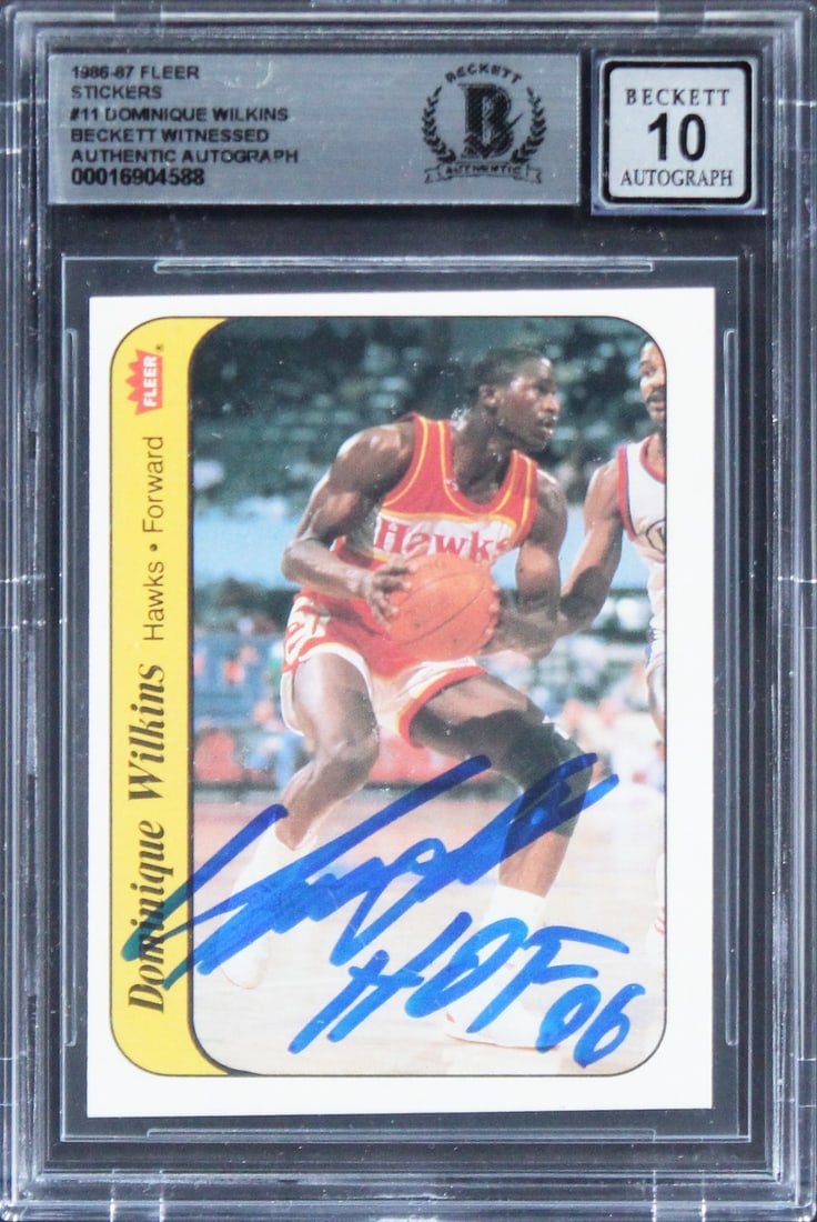 Dominique Wilkins HOF Signed 1986 Fleer Stickers RC Gem Mint 10 Beckett: Dominique Wilkins HOF Signed 1986 Fleer Stickers RC Gem Mint 10 Beckett This autographed 1986 Fleer Stickers #11 Rookie Card features a pristine Gem Mint 10 grading and includes the inscription "HOF 0