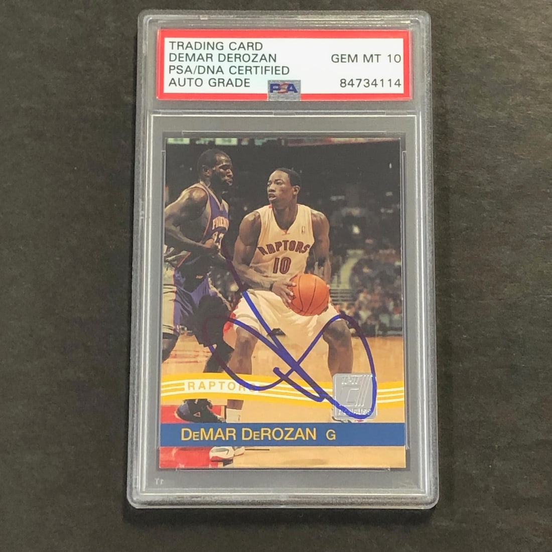 DeMar DeRozan Autographed 2010-11 Donruss Raptors Card PSA Encapsulated: DeMar DeRozan Autographed 2010-11 Donruss Raptors Card PSA Encapsulated This is a 2010-11 Panini Donruss #34 trading card featuring DeMar DeRozan, who played for the Toronto Raptors. The card is hand-