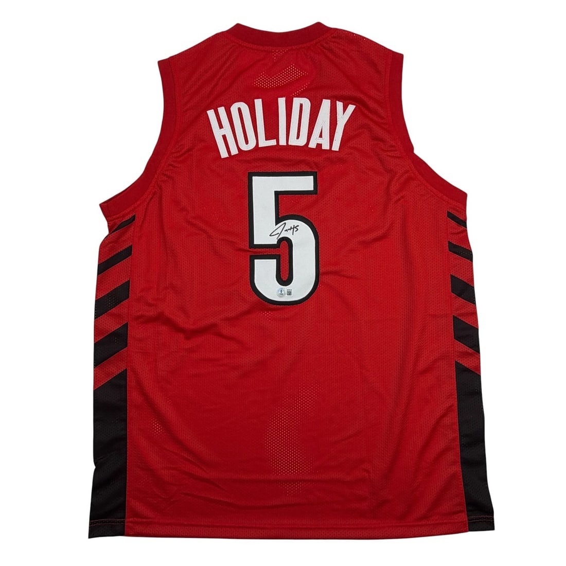 Jrue Holiday Signed Red Portland Trail Blazers Custom Jersey Beckett COA: Jrue Holiday Signed Red Portland Trail Blazers Custom Jersey Beckett COA This is a custom Portland Trail Blazers basketball jersey in red, autographed by Jrue Holiday. The jersey is made from nylon an