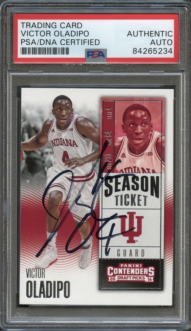 2016 Panini Contenders #7 Victor Oladipo Signed Basketball Card PSA/DNA: 2016 Panini Contenders #7 Victor Oladipo Signed Basketball Card PSA/DNA Enhance your collection with this 2016 Panini Contenders #7 basketball card, personally signed by Victor Oladipo, a standout pla