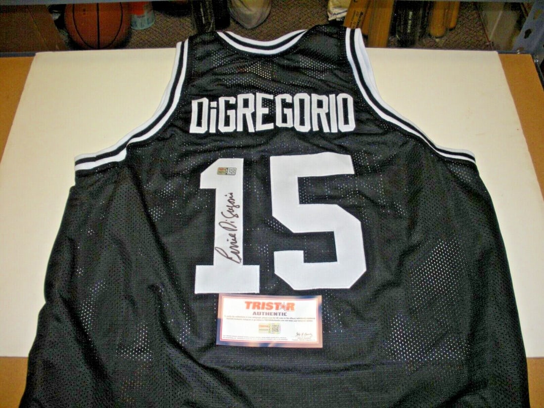 Ernie DiGregorio Signed Original Jersey Providence Friars Buffalo Braves: Ernie DiGregorio Signed Original Jersey Providence Friars Buffalo Braves This original signed jersey features Ernie DiGregorio, a prominent player for the Providence Friars and the Buffalo Braves. It 