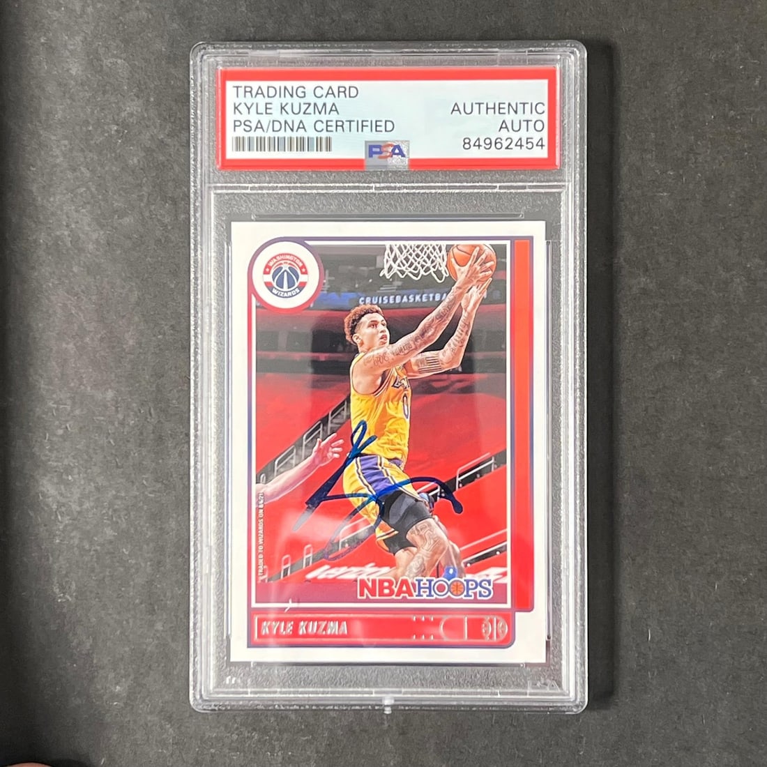2021-22 Panini Hoops #166 Kyle Kuzma Autographed Card PSA/DNA: 2021-22 Panini Hoops #166 Kyle Kuzma Autographed Card PSA/DNA Capture a piece of basketball history with this 2021-22 Panini Hoops #166 card featuring Kyle Kuzma's autograph. Authenticated by PSA/DNA 