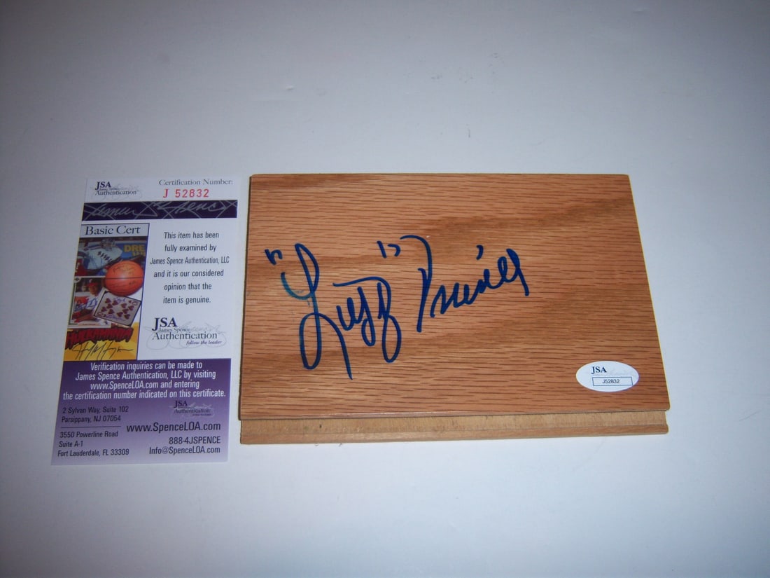 Signed Floorboard by Lefty Driesell with JSA COA Basketball Collectible: Signed Floorboard by Lefty Driesell with JSA COA Basketball Collectible This is an original floorboard signed by Lefty Driesell, notable for his coaching tenures with Maryland and Georgia State, and r
