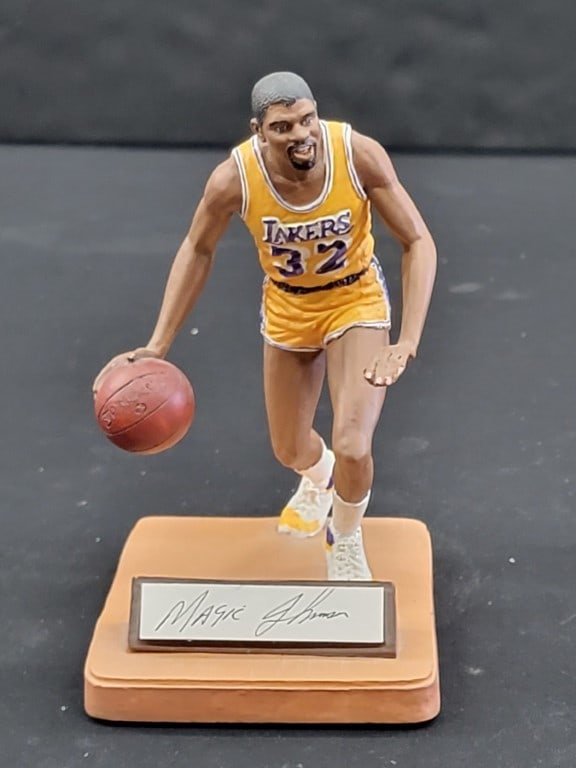 Magic Johnson Autographed Statue Los Angeles Lakers Collectible: Magic Johnson Autographed Statue Los Angeles Lakers Collectible This collectible Magic Johnson statue captures the essence of the legendary player in a detailed figurine. As a member of the Los Angele