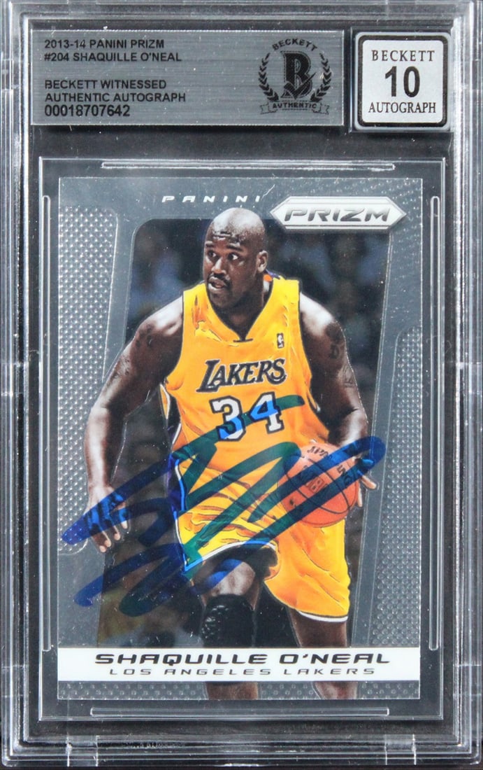 Shaquille O'Neal 2013 Panini Prizm #204 Lakers Auto BAS Slabbed: Shaquille O'Neal 2013 Panini Prizm #204 Lakers Auto BAS Slabbed This 2013 Panini Prizm #204 basketball card features a hand-signed autograph from Shaquille O'Neal of the Los Angeles Lakers. The card i