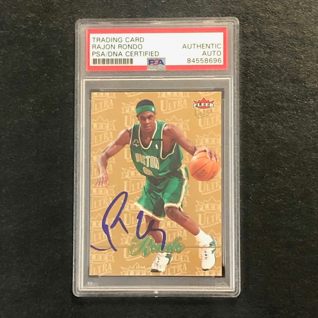 PSA DNA slabbed Rajon Rondo signed 2007-08 Fleer #13 Celtics card: PSA DNA slabbed Rajon Rondo signed 2007-08 Fleer #13 Celtics card This is a 2007-08 Fleer #13 basketball trading card featuring Rajon Rondo of the Boston Celtics. The card is hand-signed by Rajon Rond