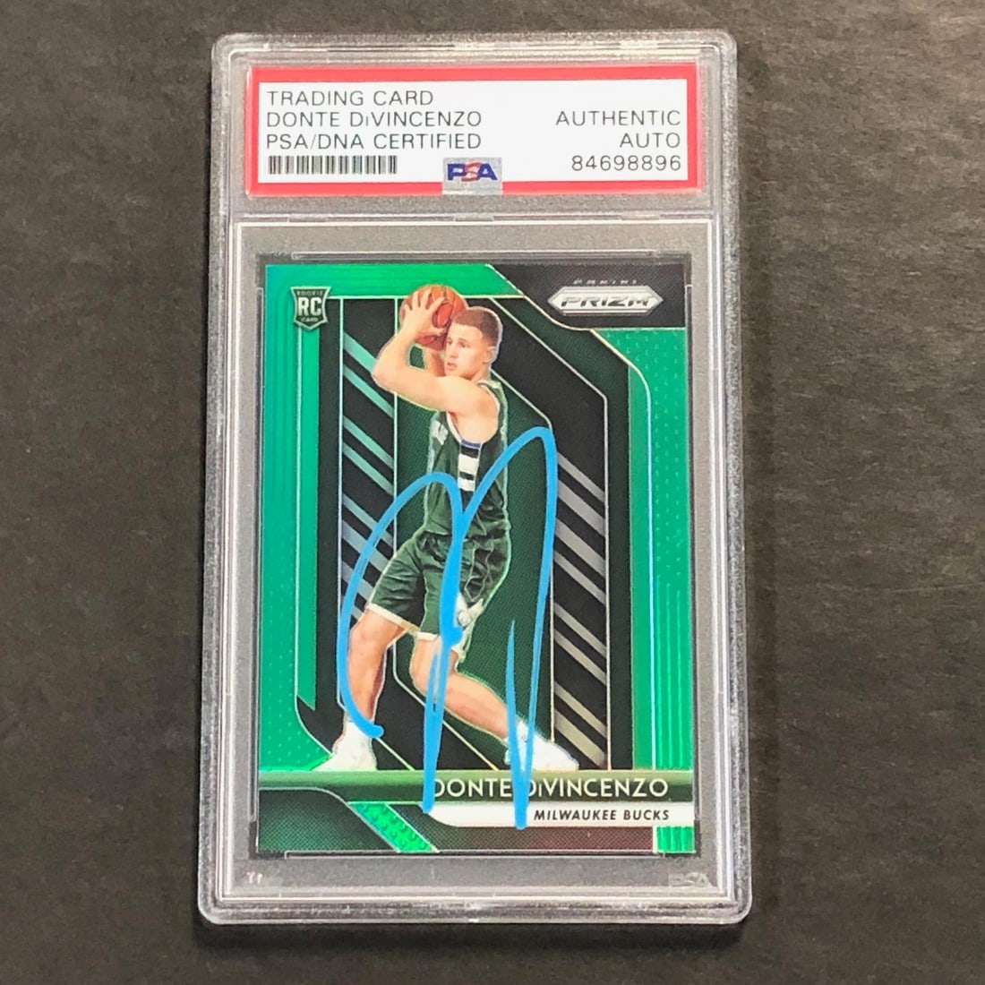 2018-19 Panini Prizm Donte DiVincenzo Signed Rookie Card PSA/DNA: 2018-19 Panini Prizm Donte DiVincenzo Signed Rookie Card PSA/DNA This listing features a 2018-19 Panini Prizm #246 trading card signed by Donte DiVincenzo, who is recognized for his time with the Milw