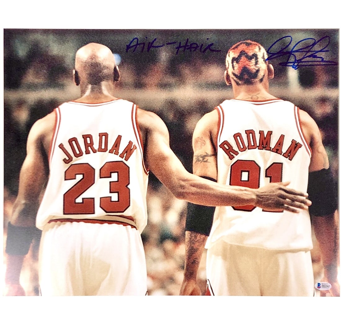 Dennis Rodman Signed 16x20 Photo with Michael Jordan BAS COA: Dennis Rodman Signed 16x20 Photo with Michael Jordan BAS COA This stunning 16x20 photograph captures the iconic moment of Dennis Rodman and Michael Jordan, featuring Rodman's autograph. The photo is a