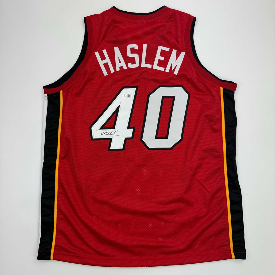 Udonis Haslem Signed Miami Heat Basketball Jersey Beckett BAS COA: Udonis Haslem Signed Miami Heat Basketball Jersey Beckett BAS COA This autographed Udonis Haslem Miami Heat red basketball jersey is a must-have for any fan or collector. The jersey features Haslem's 