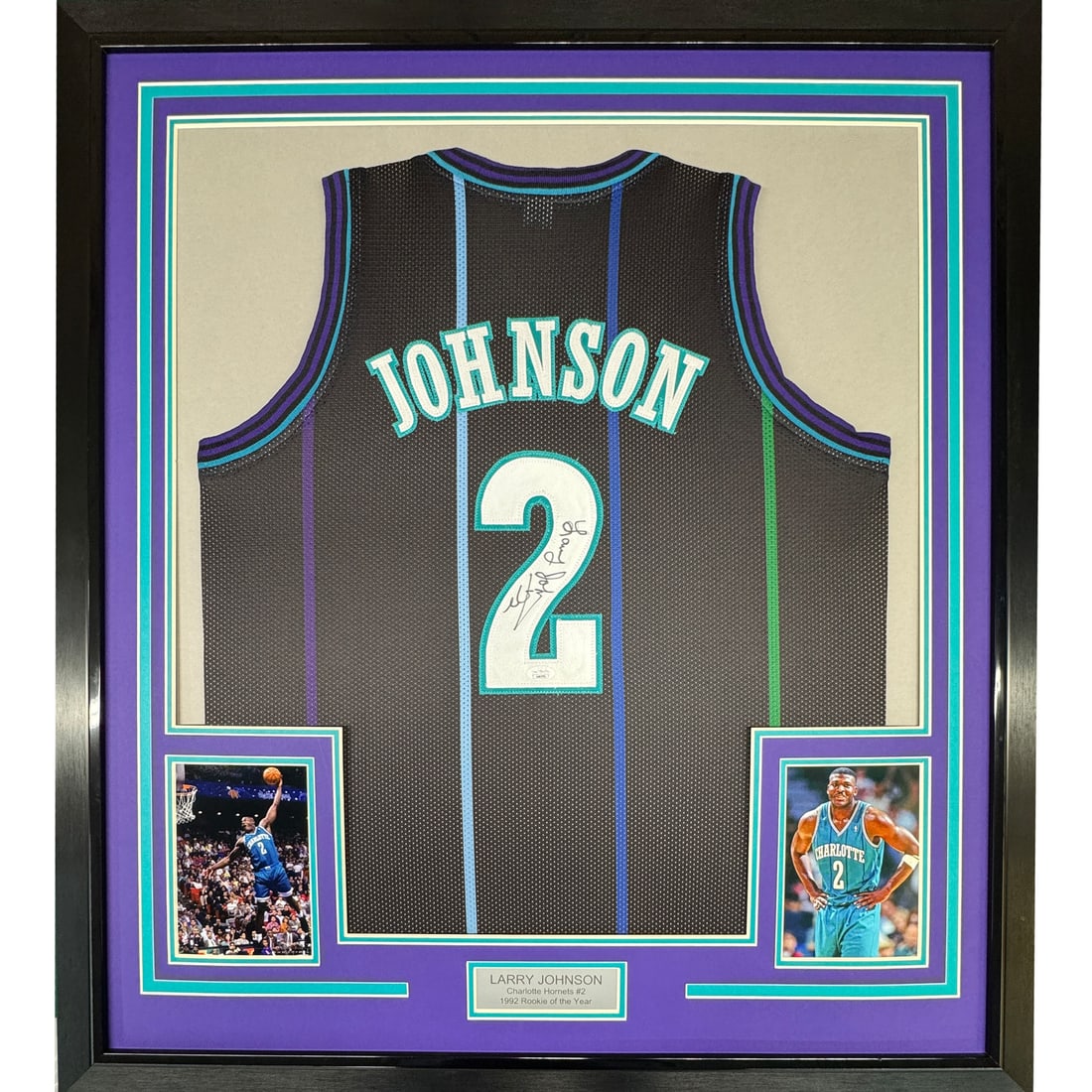Framed Larry Johnson Autographed Jersey 33x42 Charlotte Hornets JSA COA: Framed Larry Johnson Autographed Jersey 33x42 Charlotte Hornets JSA COA This professionally framed and matted display features an autographed Larry Johnson jersey, a tribute to the NBA star's legacy w