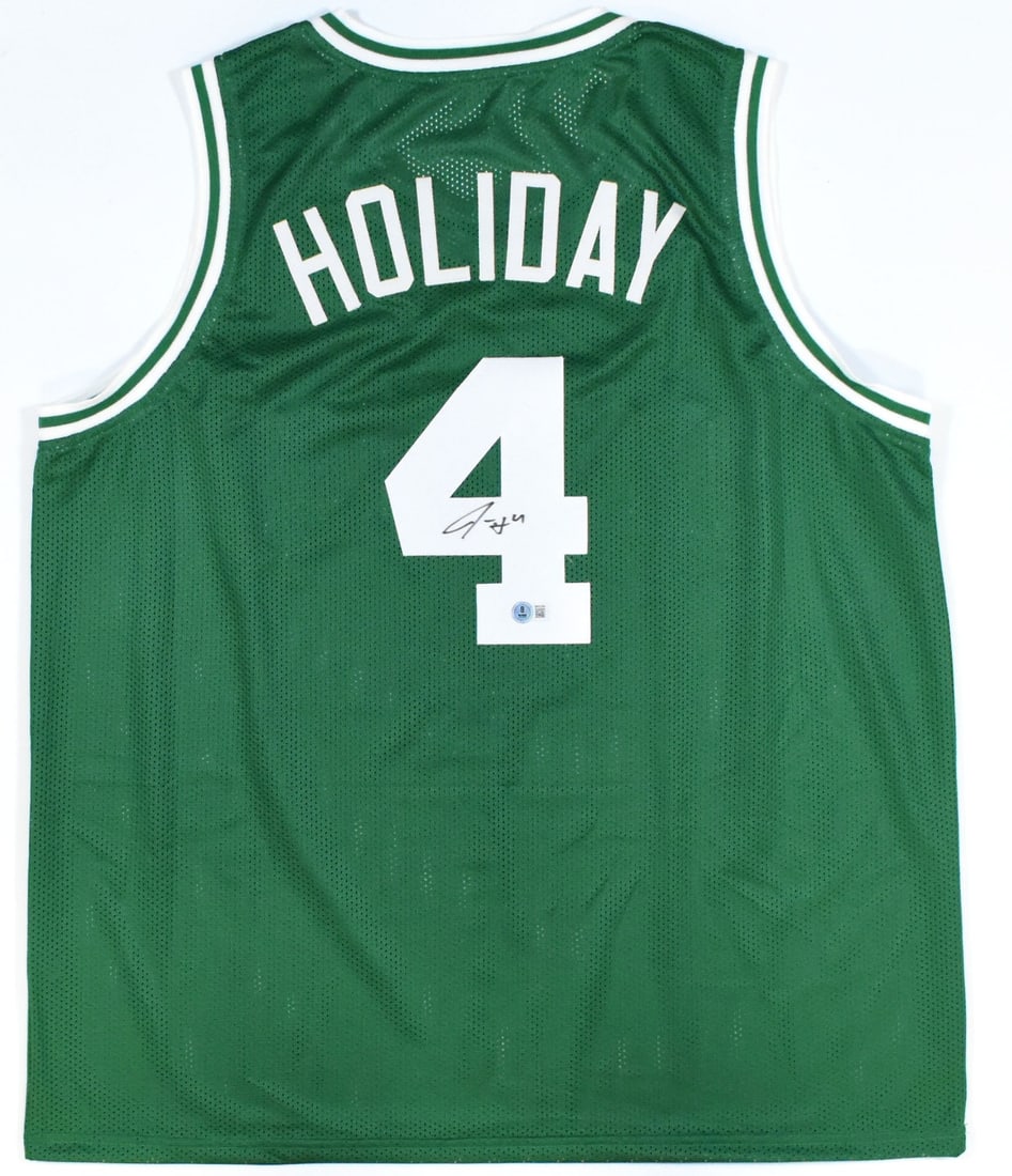 Boston Celtics Jrue Holiday signed green pro style jersey Beckett hologram: Boston Celtics Jrue Holiday signed green pro style jersey Beckett hologram This is a green pro style jersey autographed by Jrue Holiday. The jersey features his signature and is authenticated with a B