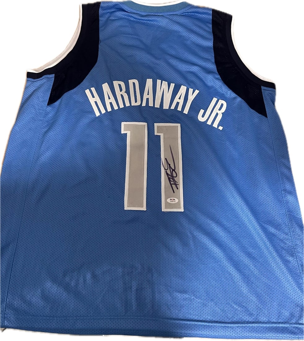 Tim Hardaway Jr. Dallas Mavericks Autographed PSA DNA Basketball Jersey: Tim Hardaway Jr. Dallas Mavericks Autographed PSA DNA Basketball Jersey This is a stitched Dallas Mavericks basketball jersey autographed by Tim Hardaway Jr. The autograph has been authenticated by