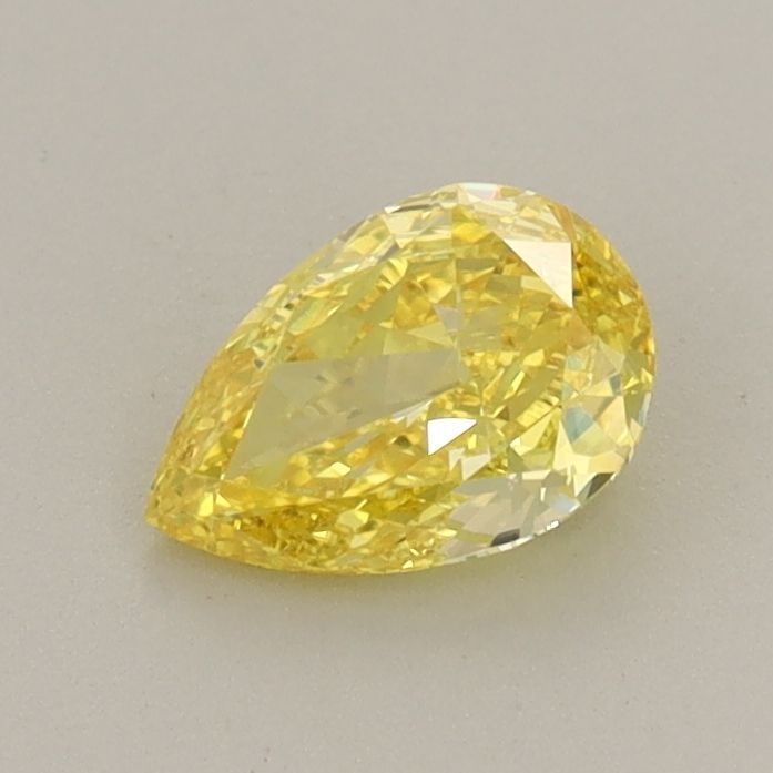 Loose Diamond - PEAR 0.57ct Fancy Vivid Yellow VS2: Loose Diamond - PEAR 0.57ct Fancy Vivid Yellow VS2 Source: This is a real non-mined Diamond that has been grown in a lab Shape: PEAR Carats: 0.57 Color: Fancy Vivid Yellow Certification: IGI Video: