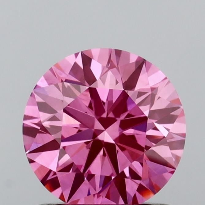 Ideal Loose Diamond - ROUND 1.0ct Fancy Vivid Pink VS1: Ideal Loose Diamond - ROUND 1.0ct Fancy Vivid Pink VS1 Source: This is a real non-mined Diamond that has been grown in a lab Shape: ROUND Carats: 1.0 Color: Fancy Vivid Pink Certification: IGI Video: