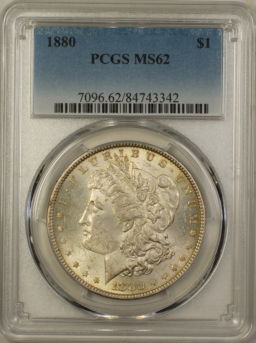 PCGS MS-62 1880 Morgan Dollar Silver Coin: PCGS MS-62 1880 Morgan Dollar Silver Coin This 1880 Morgan Silver Dollar is a $1 coin from the United States, minted in Philadelphia. Graded MS 62 by PCGS, it is uncirculated and features attractive t