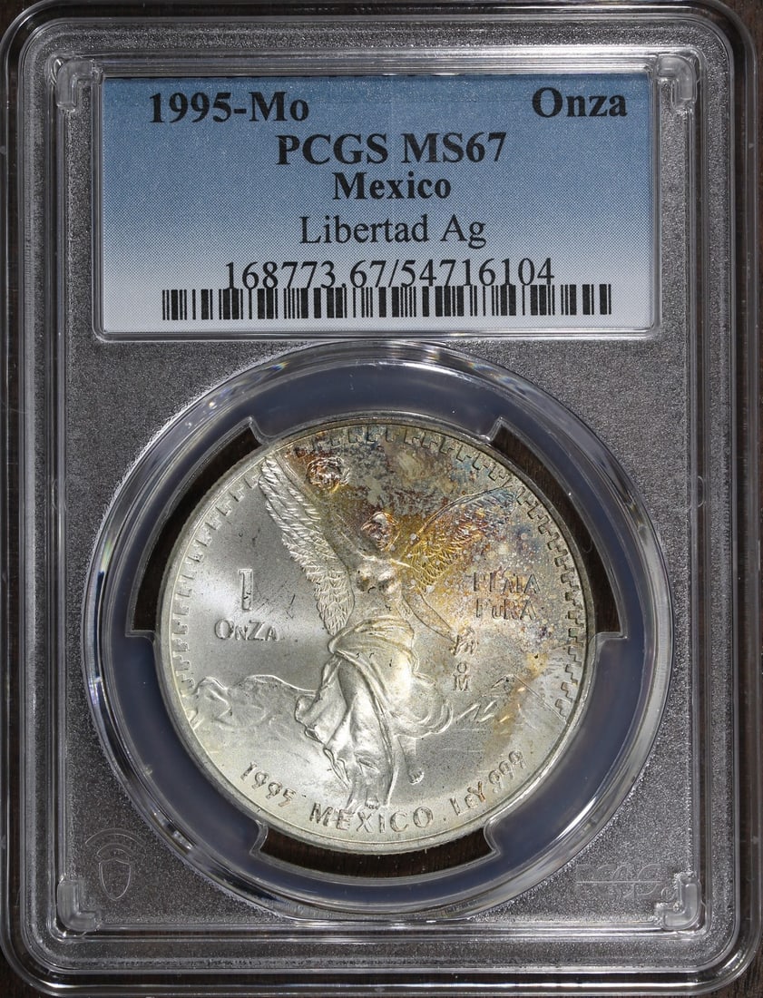 PCGS MS67 1995-Mo Mexico 1 oz Silver Libertad Onza Coin: PCGS MS67 1995-Mo Mexico 1 oz Silver Libertad Onza Coin 1995 Mexico 1 oz Silver Libertad Onza coin graded MS 67 by PCGS. Struck in 0.999 fine silver by the Mexican Mint, this pre-owned coin is from Me