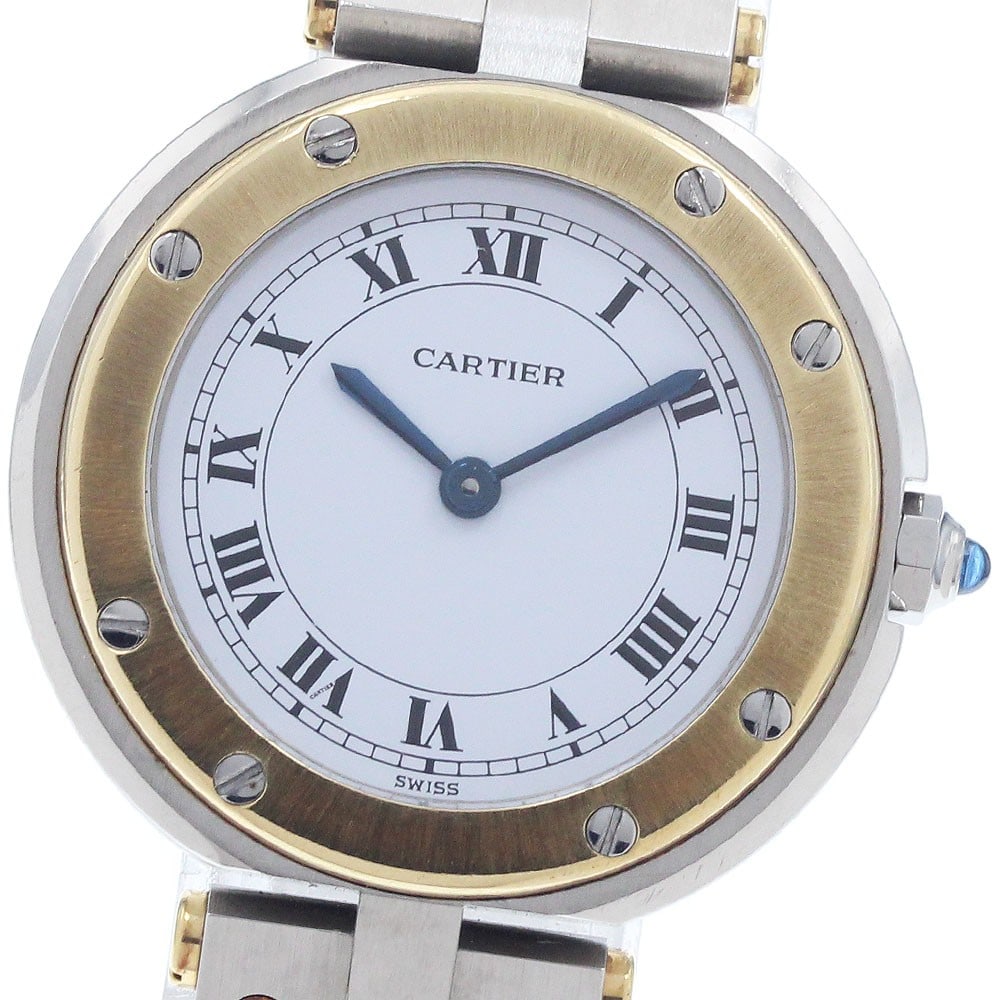 Cartier Ladies Quartz Wristwatch Stainless Steel With Yellow Gold Bezel: Cartier Ladies Quartz Wristwatch Stainless Steel With Yellow Gold Bezel This Cartier Santos Round SM wristwatch features a yellow gold bezel and a stainless steel case. Designed for women, it operates