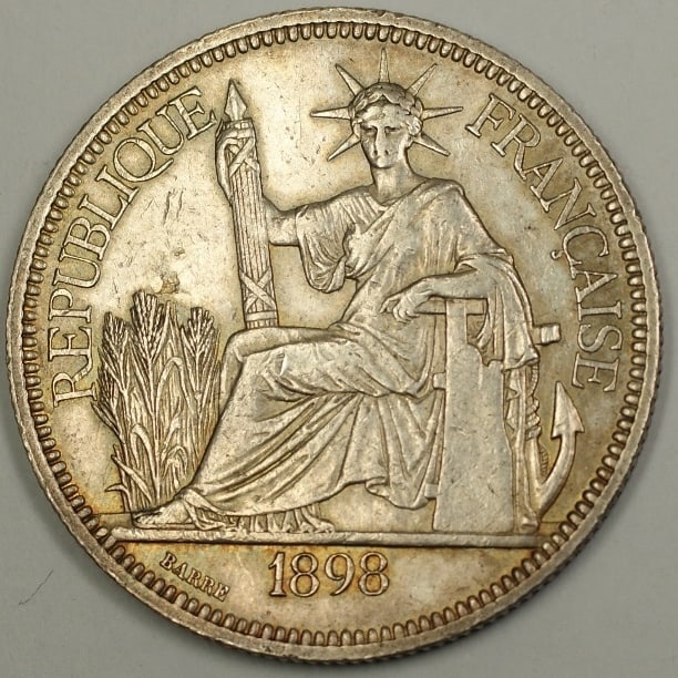 1898 French Indochina Silver Piastre Crown Coin from France: 1898 French Indochina Silver Piastre Crown Coin from France This 1898 French Indochina Silver Crown Piastre coin originates from France and is in pre-owned condition. The coin is uncertified, offering