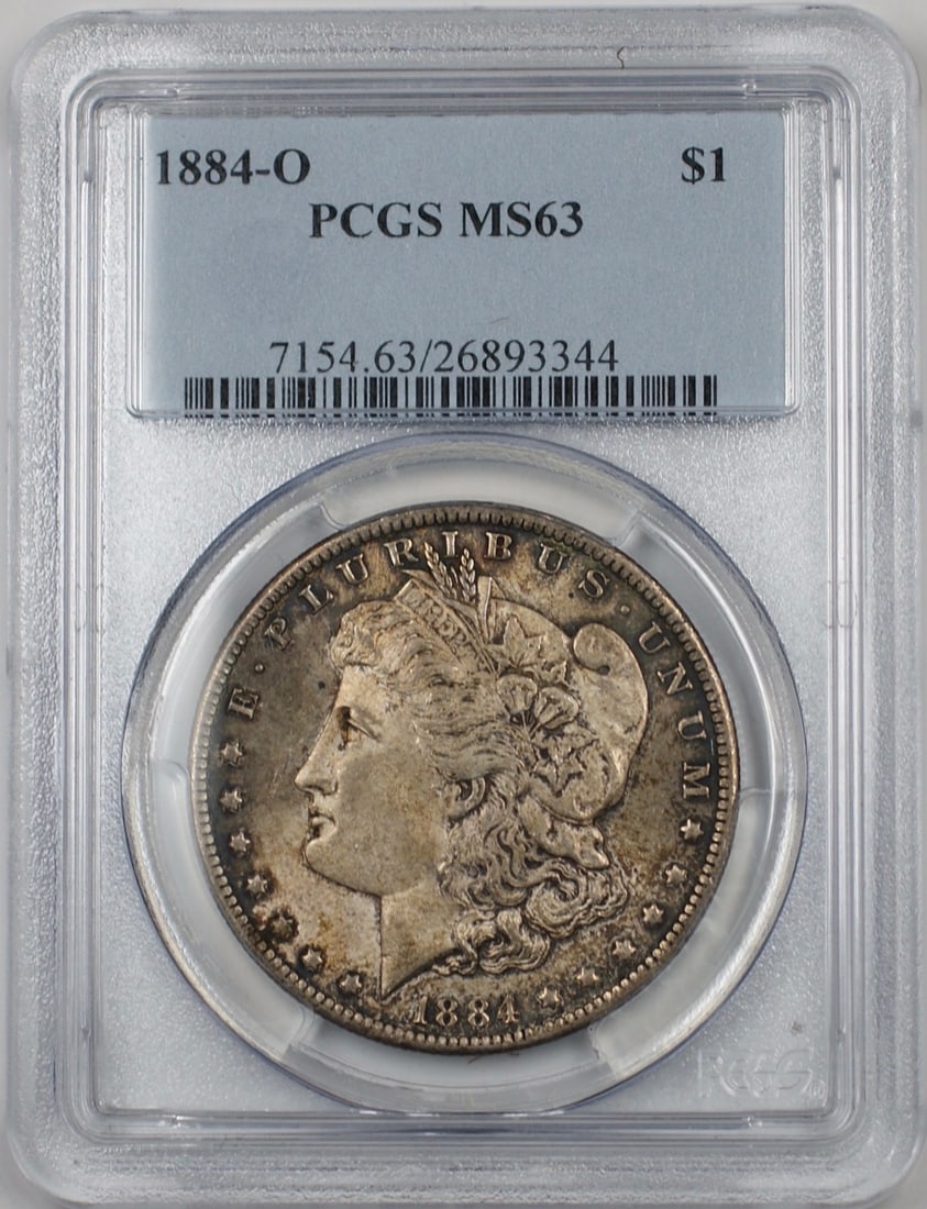 PCGS MS-63 1884-O Morgan Silver Dollar Toned Uncirculated $1 Coin: PCGS MS-63 1884-O Morgan Silver Dollar Toned Uncirculated $1 Coin This is an 1884-O Morgan Silver Dollar coin graded MS-63 by PCGS. Struck at the New Orleans Mint, this uncirculated coin features attr