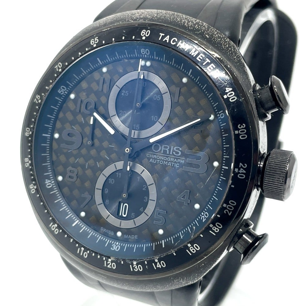 Oris TT3 Black Automatic Chronograph Men's Titanium Watch 7611: Oris TT3 Black Automatic Chronograph Men's Titanium Watch 7611 This Oris TT3 Chronograph men's wristwatch features a black dial and a robust titanium case paired with a rubber strap. The automatic mov