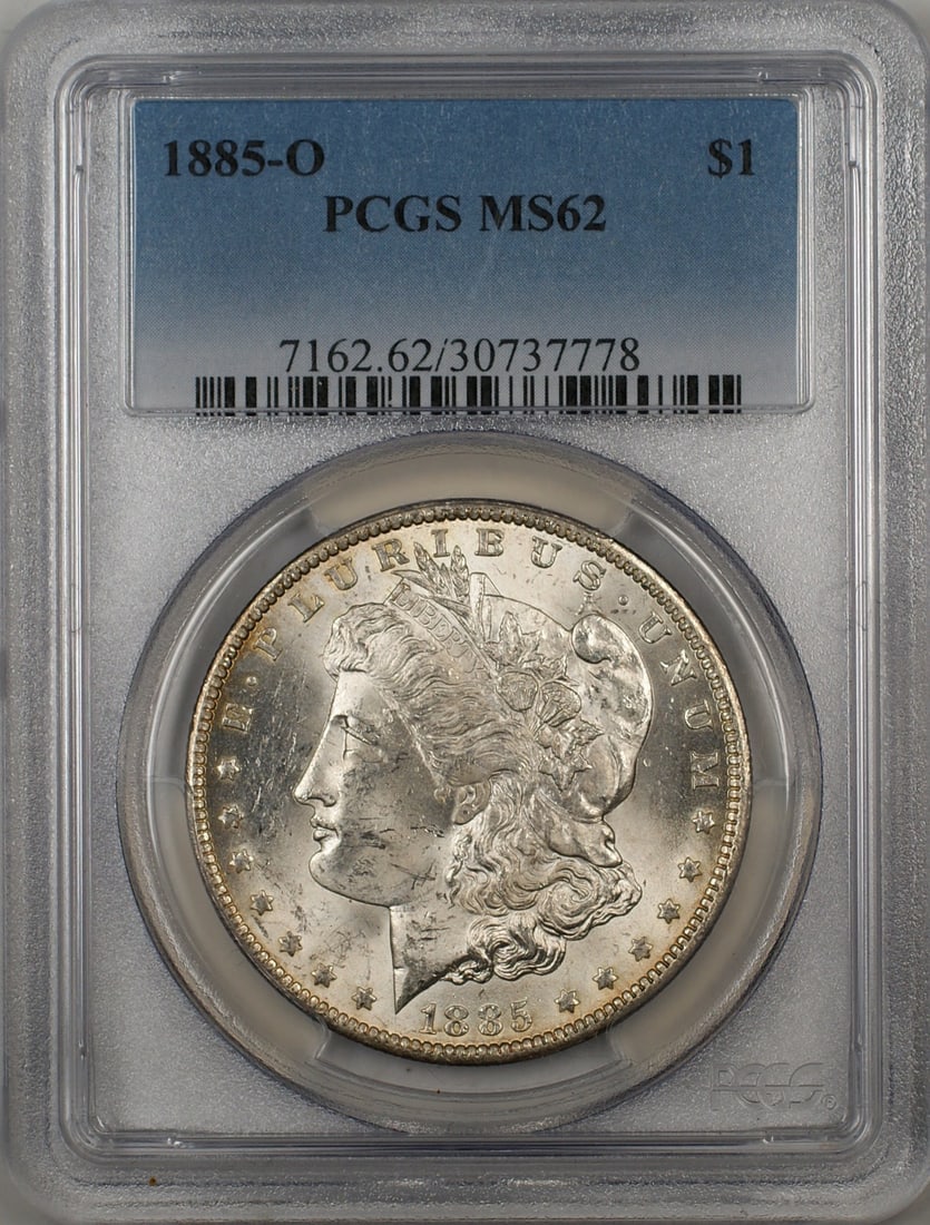 PCGS MS62 1885-O Silver Dollar with Toned Reverse: PCGS MS62 1885-O Silver Dollar with Toned Reverse This 1885-O Morgan Silver Dollar is certified by PCGS with a grade of MS 62. Minted in New Orleans, the coin features a toned reverse and is composed 