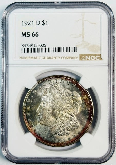 NGC MS66 1921 Denver Morgan Dollar with Attractive Toning: NGC MS66 1921 Denver Morgan Dollar with Attractive Toning This 1921 D Morgan Silver Dollar is graded MS-66 by NGC and features attractive toning. Struck in silver at the Denver Mint, this uncirculated