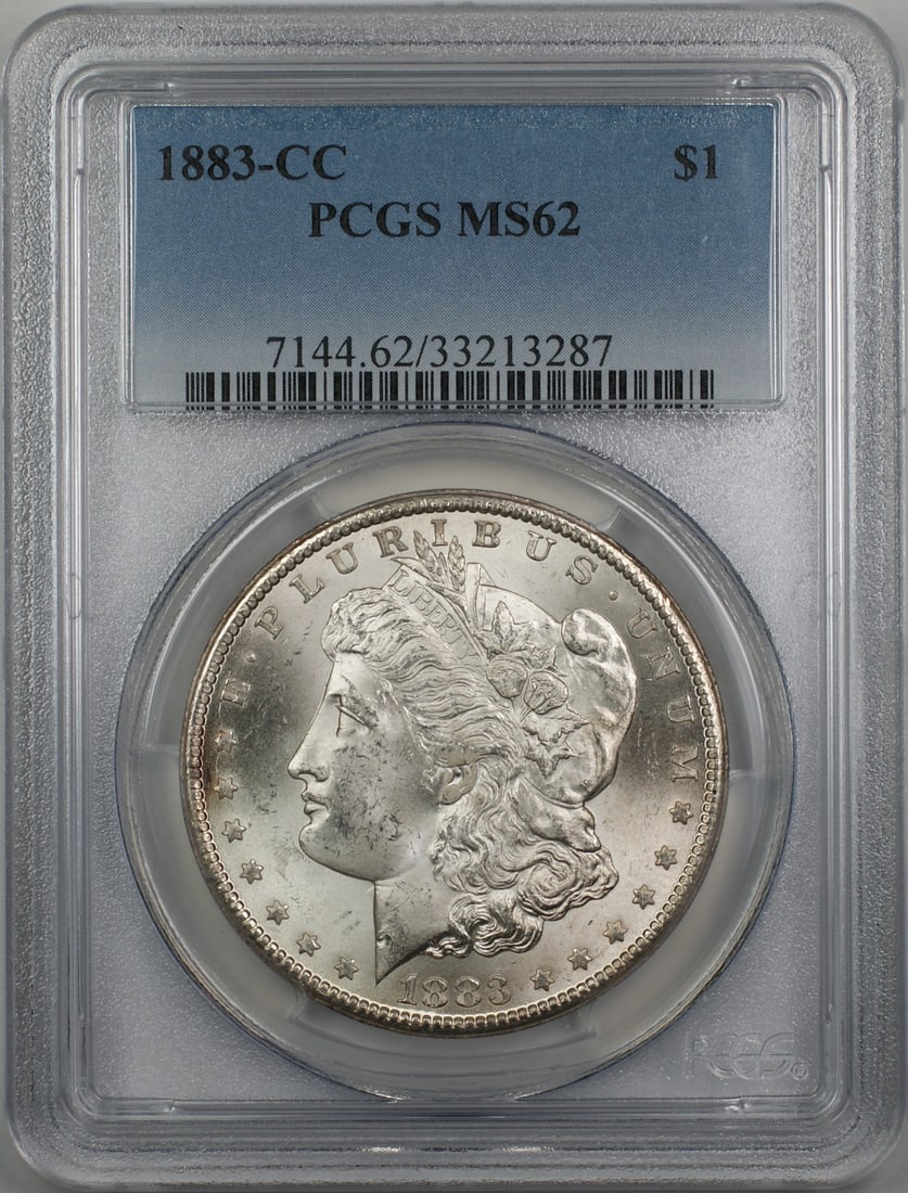 PCGS MS62 1883 Carson City Morgan Dollar Silver Coin: PCGS MS62 1883 Carson City Morgan Dollar Silver Coin This is an un-used 1883-CC Morgan Silver Dollar $1 coin certified by PCGS with a grade of MS 62. Minted in Carson City, this collectible coin featu
