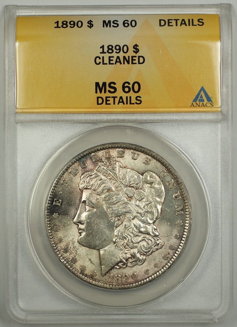ANACS MS 60 1890 Morgan silver dollar cleaned toned: ANACS MS 60 1890 Morgan silver dollar cleaned toned This 1890 Morgan Silver Dollar was minted in Philadelphia and is composed of silver. Graded MS-60 Details by ANACS, the coin has been cleaned and di